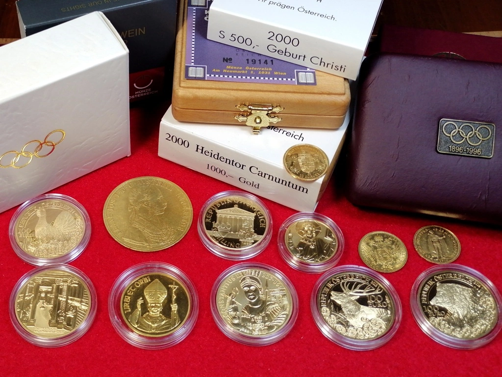 zlate mince a medaile